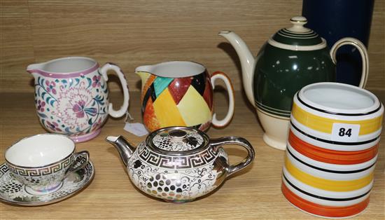 Susie Cooper for Grays Pottery - two jugs, a vase, a coffee pot and a silver lustre teapot and tea cup and saucer